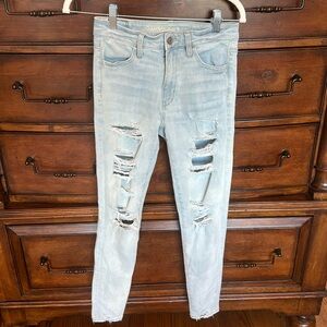 American Eagle super high rise jegging crop size 2. Very distressed. EUC